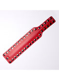 Paddle en cuir rouge à clous